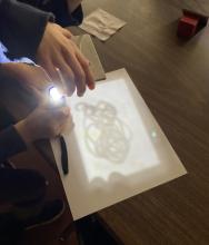 students model how the Moon reflects light