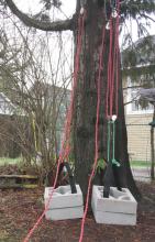 Lifting a concrete load with different pulley configurations
