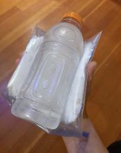 Feel the iced water bottle through the fat