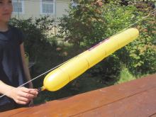 long balloon on a string