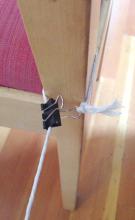 attachment of string to chair