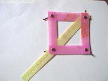 A square shape with a cross piece to become two triangles is sturdy