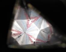 Coloured paper viewed through kalaidoscope