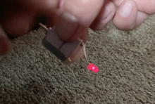 hand-spinning motor to light LED bulb
