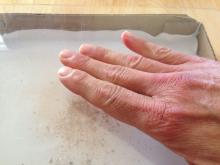 Rub a plexi sheet to attract the electrostatic dust particles and make them dance