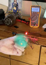 using a leaf blower to spin motor and light LED bulb