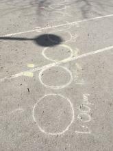 Lamp post sundial time markers (note the shadow has shifted from the day they were written)