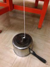 Use a steel saucepan as a base