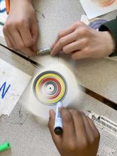 Spin art: add colour as the cardboard spins
