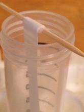 Roll the top of the filter paper around a toothpick