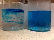 A few minutes after adding blue food dye to cold water (left) and warm water (right)